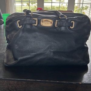 Michael Kors pebble black leather satchel with gold accents